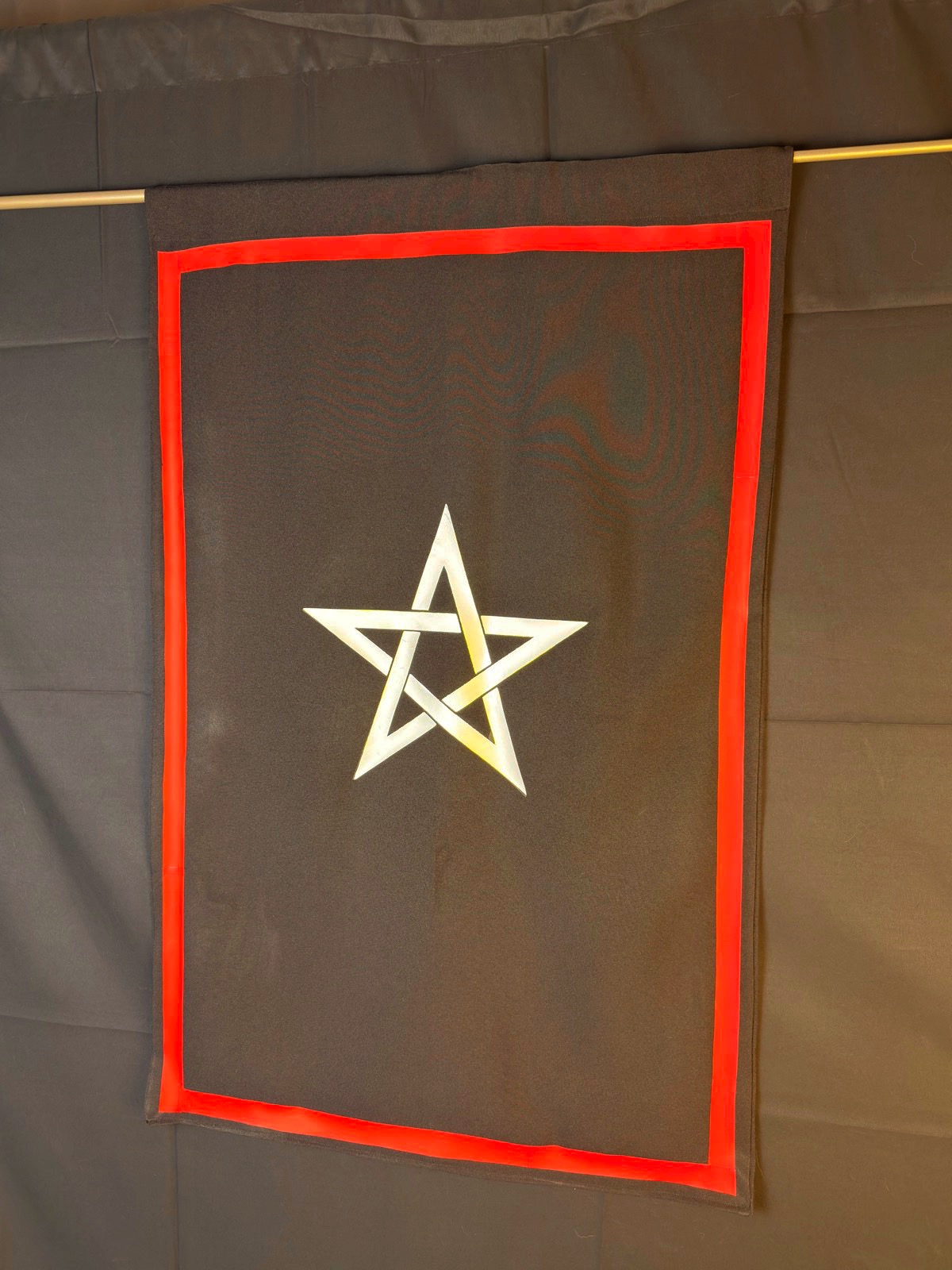 Initiate Banner for Russian Martinism shown at an angle, with dark field, rose border, and white five-pointed star for OMI / OMCC Martinist lodge use.