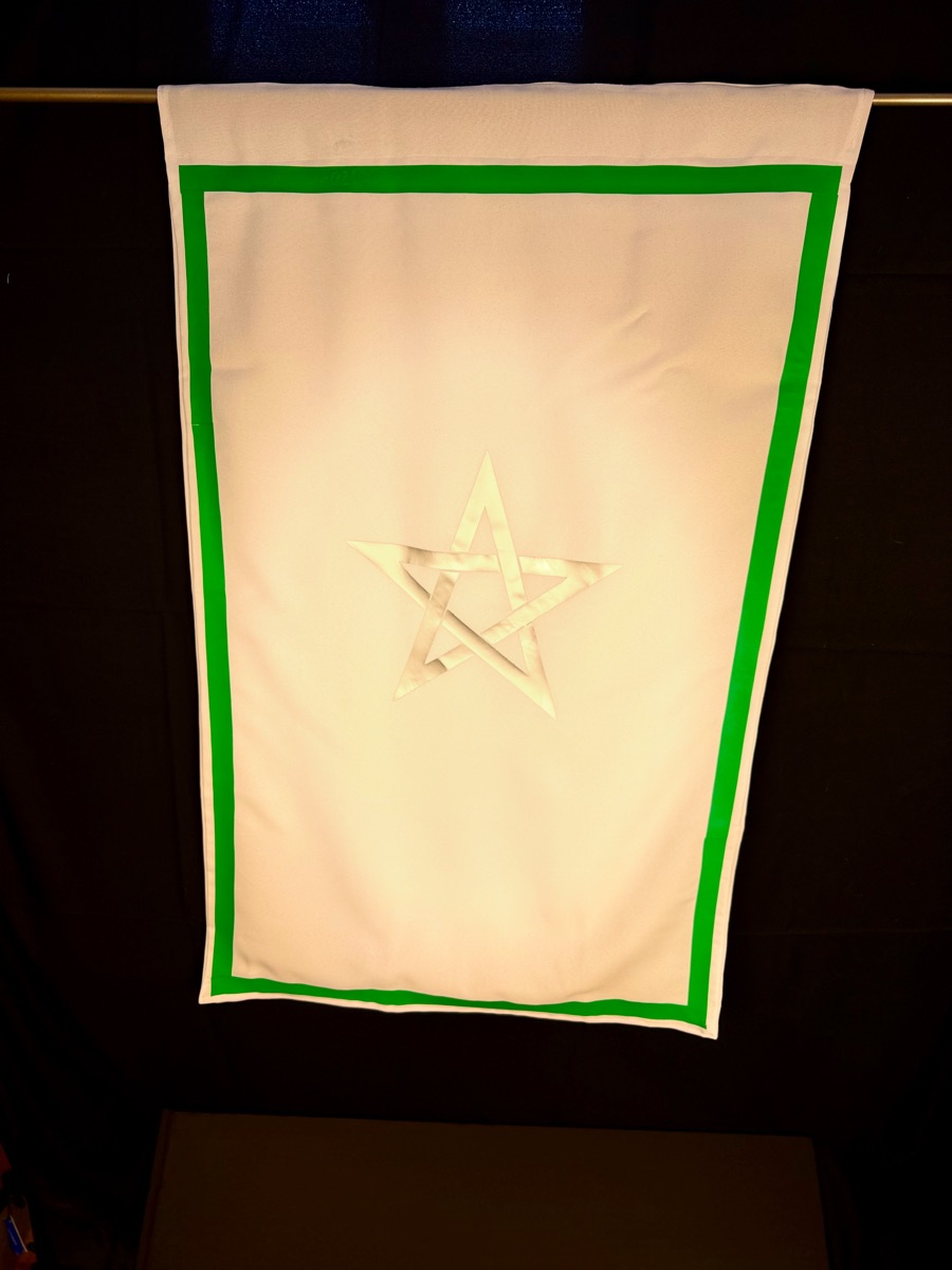 Martinist Initiate Banner for Russian Martinism, hanging view of the white field, green border, and silver five-pointed star for OMI / OMCC Martinist lodge use.